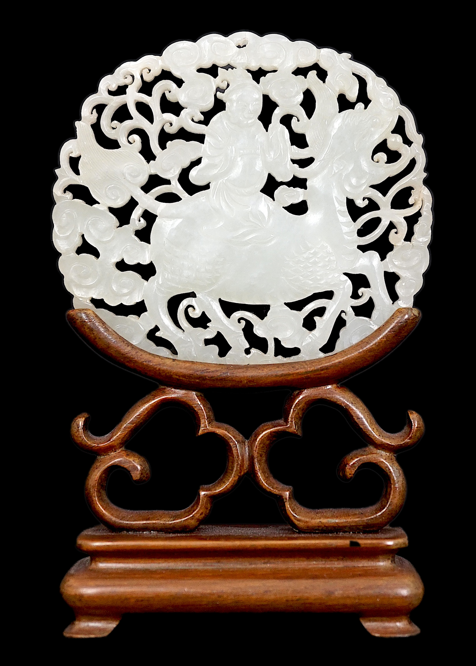 A Chinese white jade ‘qilin and rider’ plaque, 18th/19th century